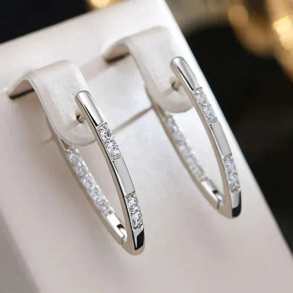 Pendientes elegantes con piedras de zirconia